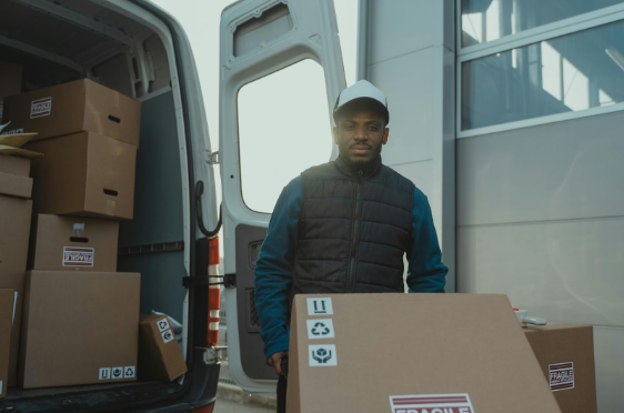 a worker transports a shipment of boxes – AMS Fulfillment