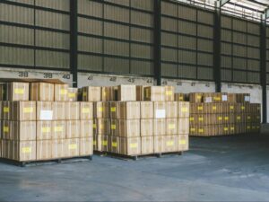 Boxed cargo being prepared for shipment in a warehouse – AMS Fulfillment